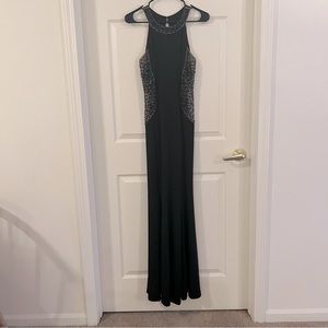 Black formal fitted dress with rhinestone sides and collar